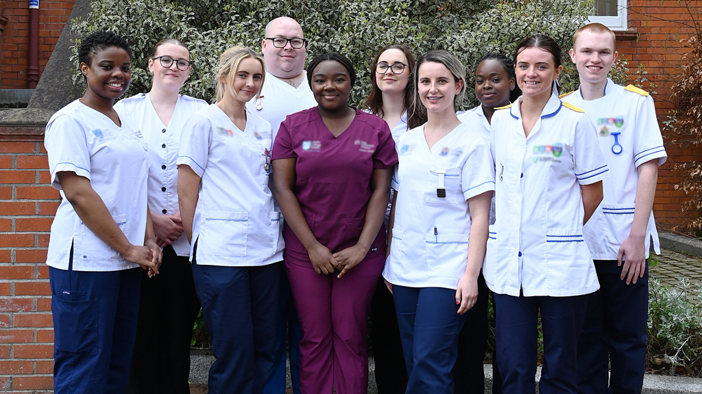 Student nurses and midwives standing in a group outside the Richmond Building Dublin